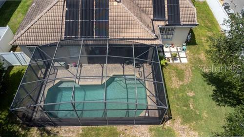 65 Calliope Street Ocoee, FL 34761 - Photo 50 of 60 a small pool is sitting in the middle of a house