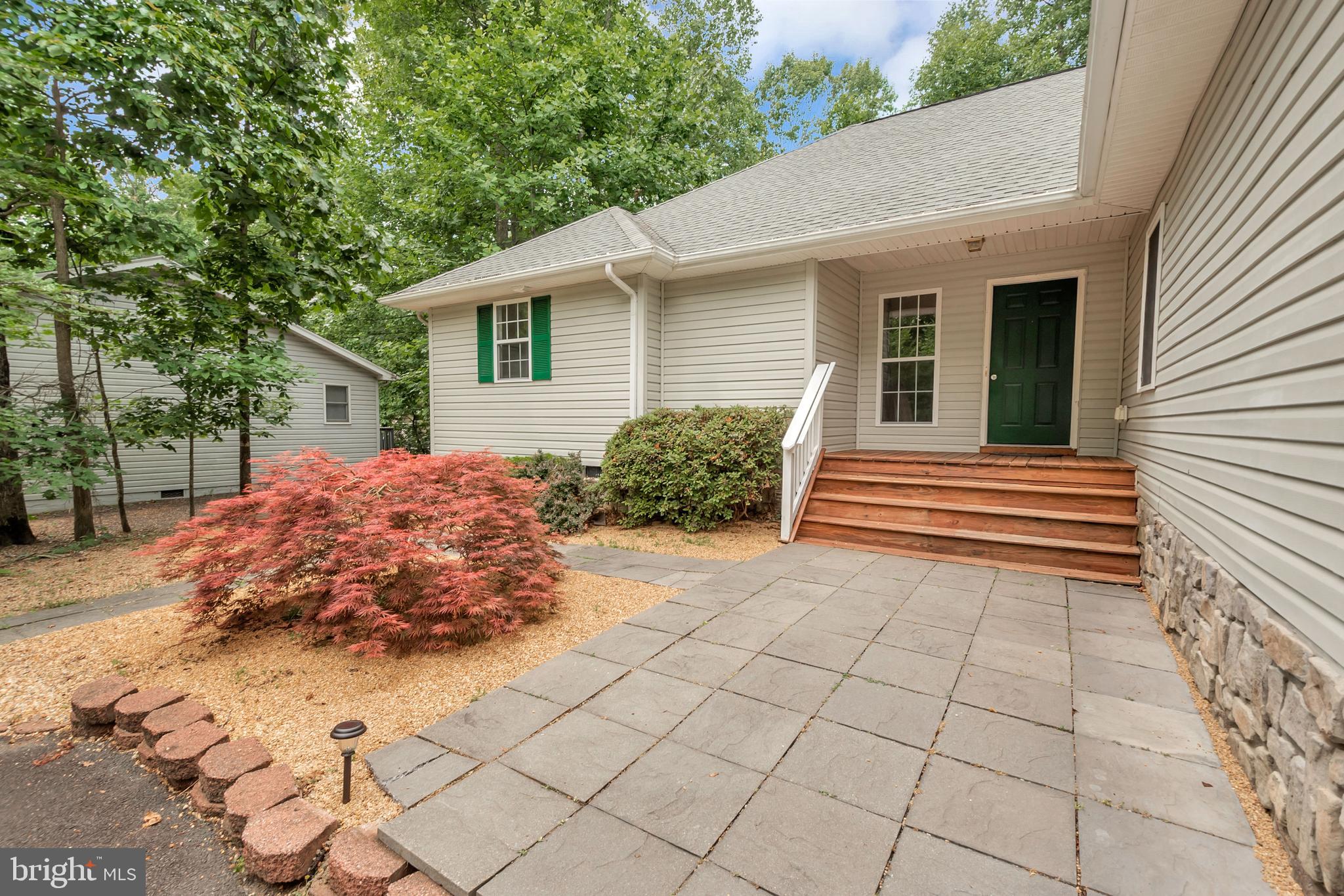 214 Monument Road Locust Grove, VA 22508 - Photo 3 of 30 Extensive hardscape adds curb appeal