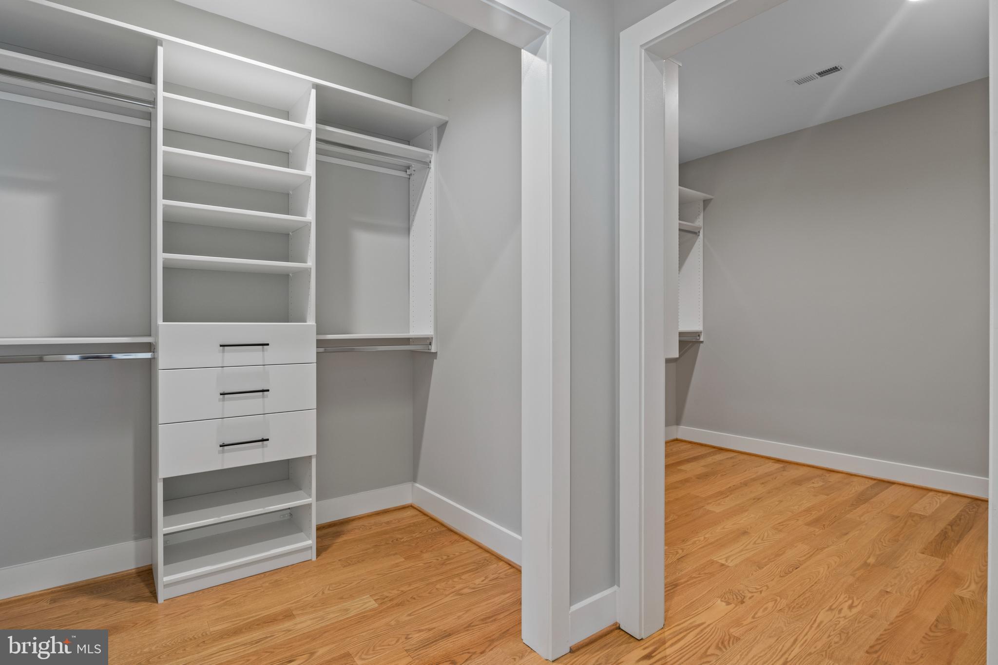 5912 Kingswood Road Bethesda, MD 20814 - Photo 10 of 13 a view of walk in closet with empty racks