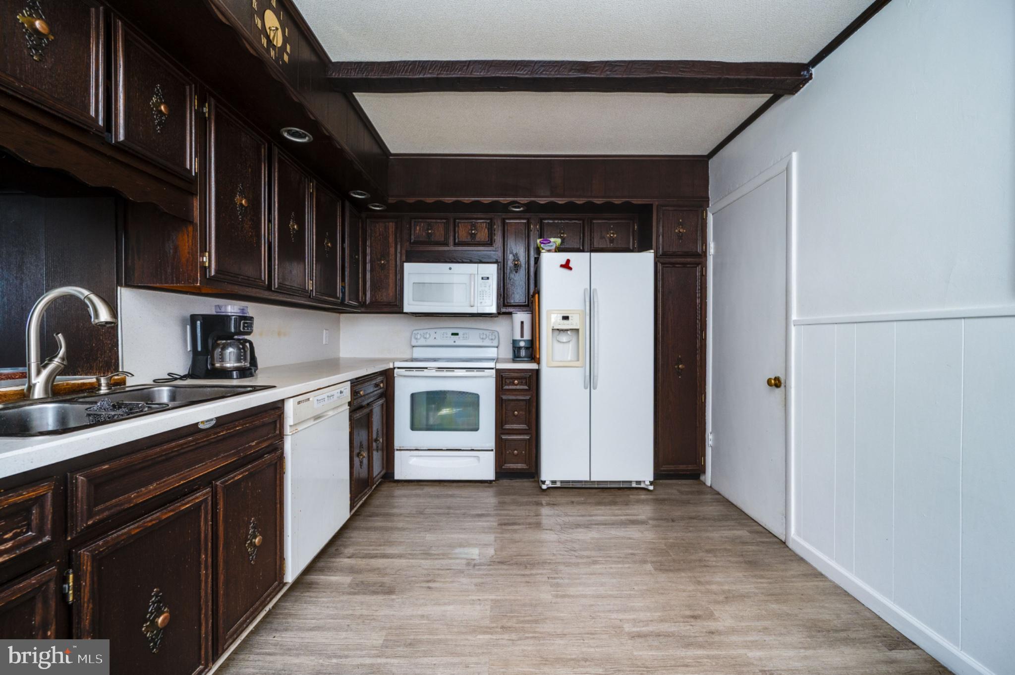 1448 Luzerne Street Reading, PA 19601 - Photo 11 of 32 Charming kitchen with rich wood accents.