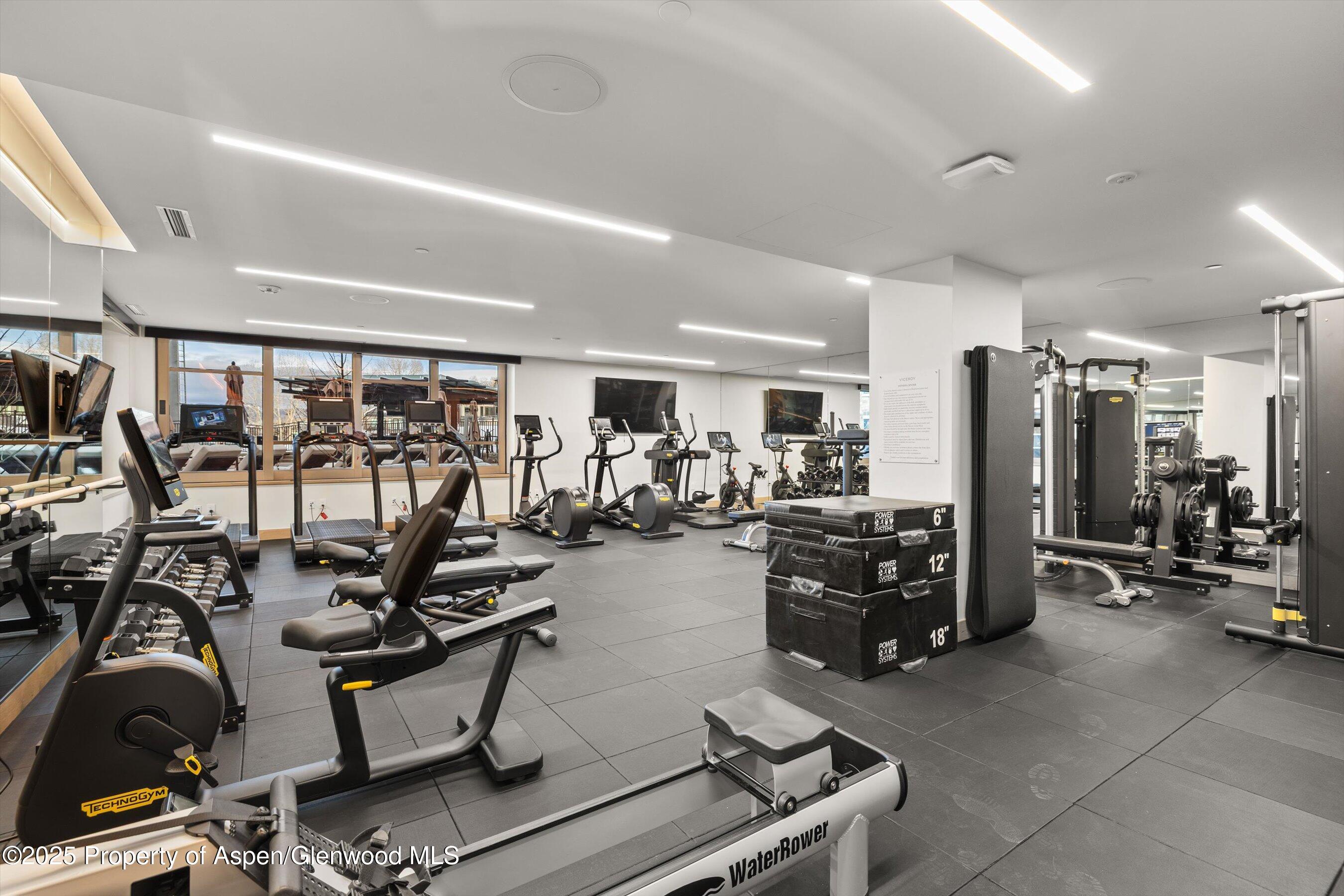 130 Wood Road, Unit 660662 Snowmass Village, CO 81615 - Photo 23 of 31 a view of a room with gym equipment