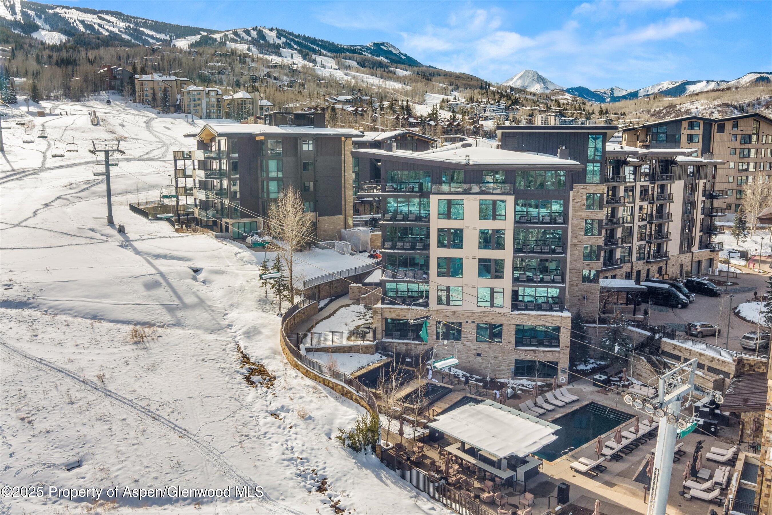 130 Wood Road, Unit 660662 Snowmass Village, CO 81615 - Photo 30 of 31 a view of a building with a outdoor space