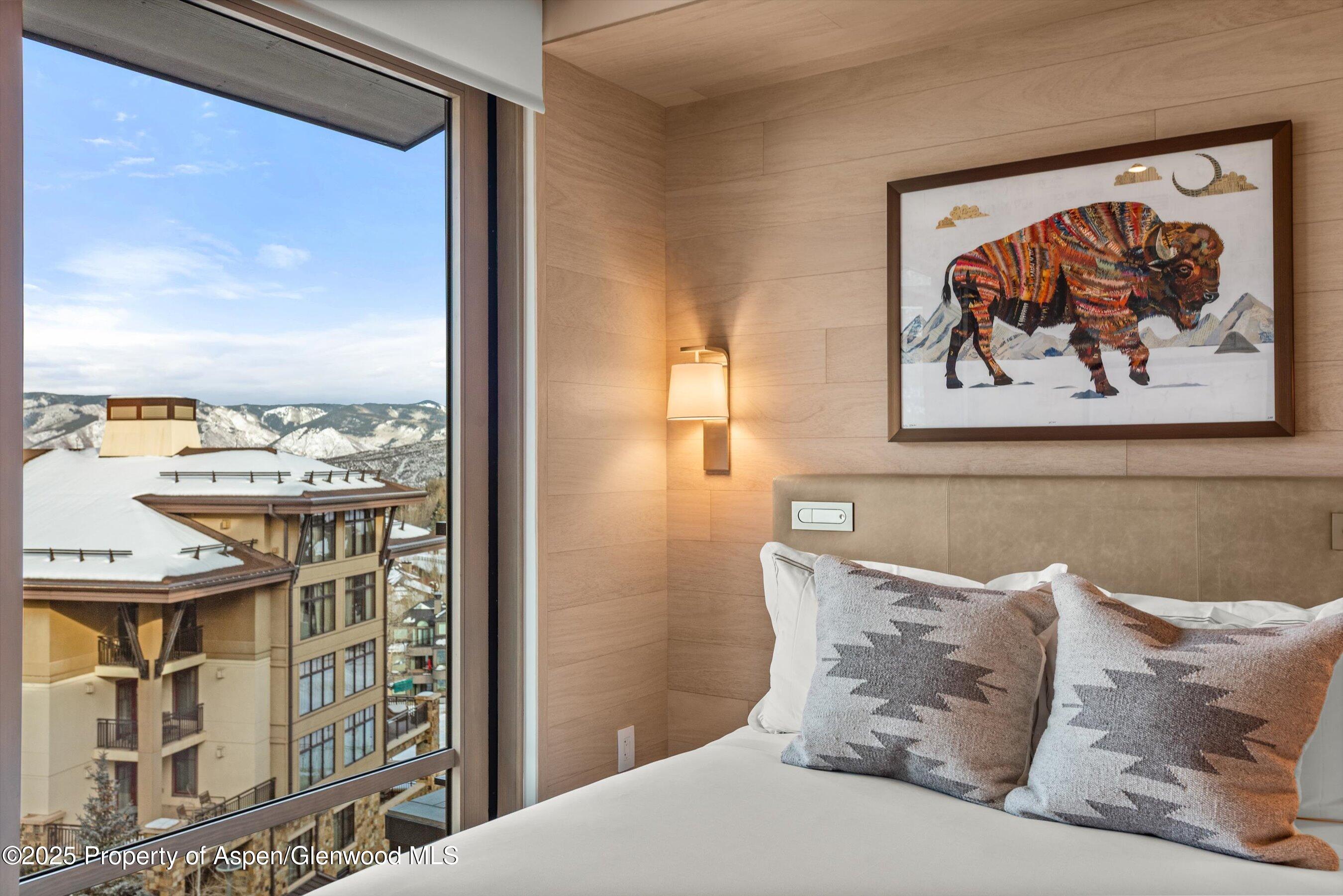 130 Wood Road, Unit 660662 Snowmass Village, CO 81615 - Photo 31 of 31 a picture of a couch in a balcony