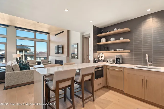 a kitchen with counter space cabinets and appliances