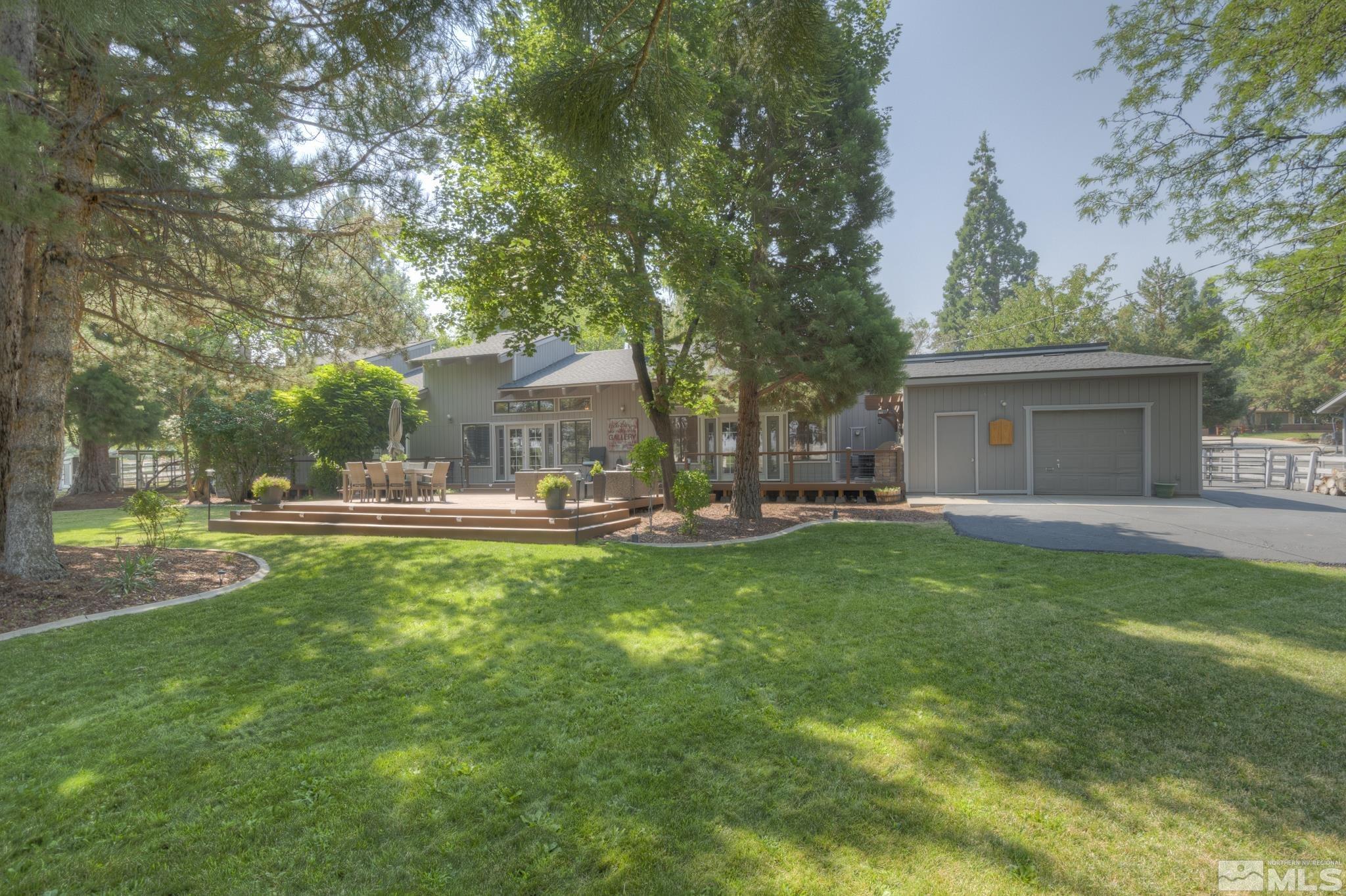 4185 Juniper Creek Road Reno, NV 89519 - Photo 35 of 40 a front view of house with yard and green space