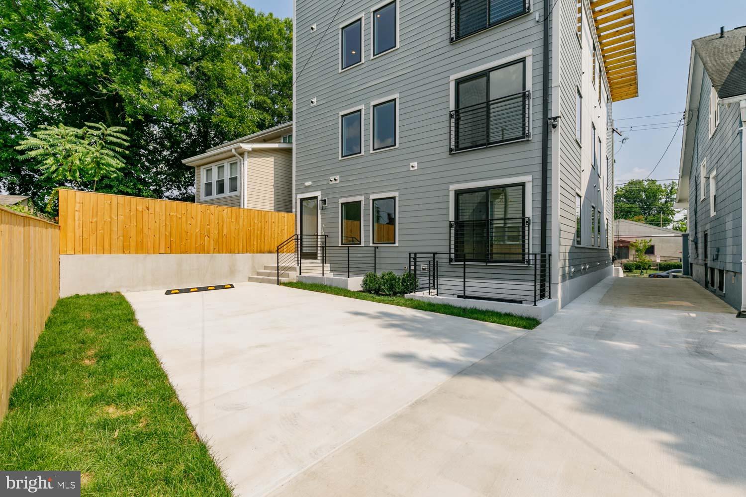1818 Rhode Island Avenue Northeast, Unit 4 Washington, DC 20018 - Photo 13 of 15 a view of backyard of house