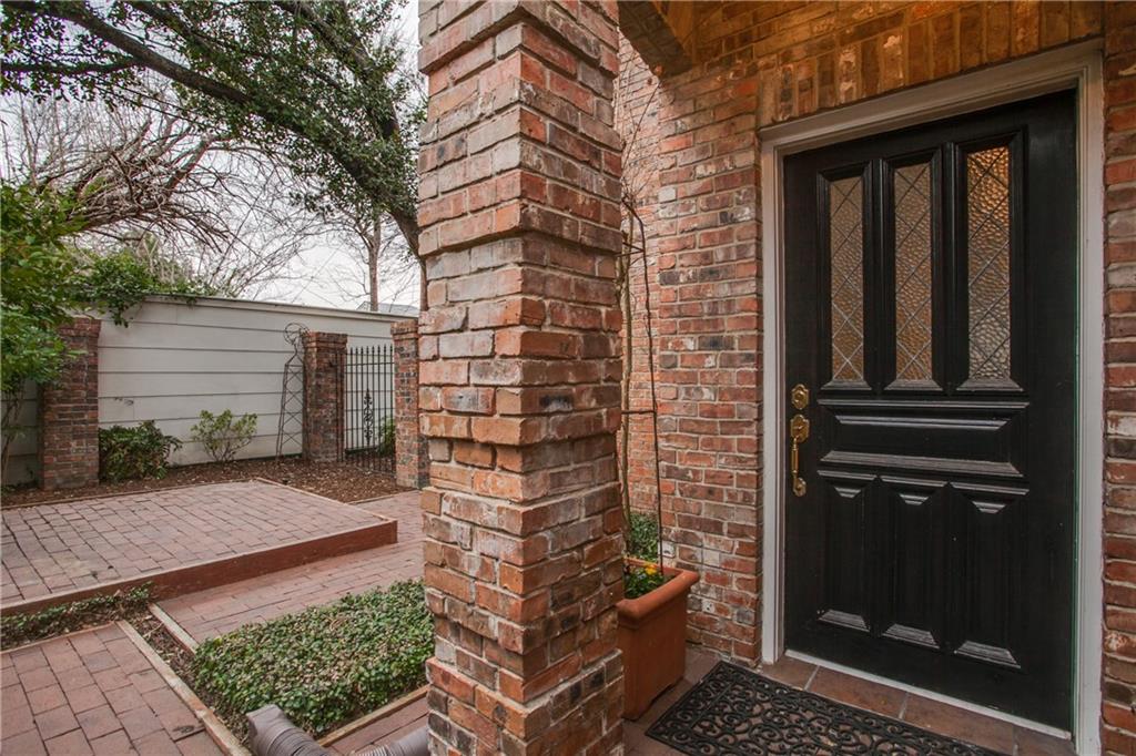 7059 Inwood Road Dallas, TX 75209 - Photo 1 of 1 front view of a house with a door