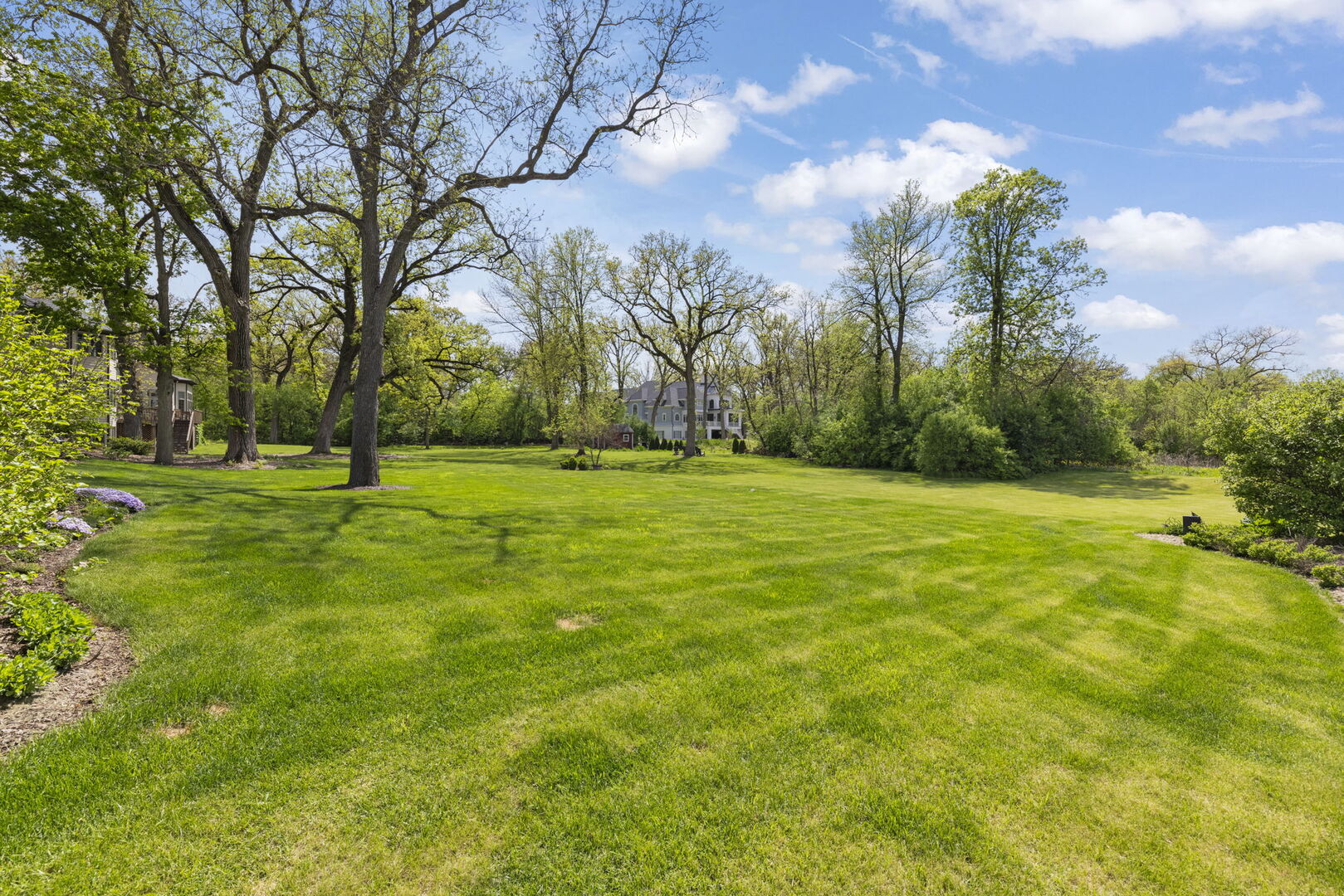1760 Shaffner Road Wheaton, IL 60189 - Photo 50 of 75 a view of a grassy field with trees around