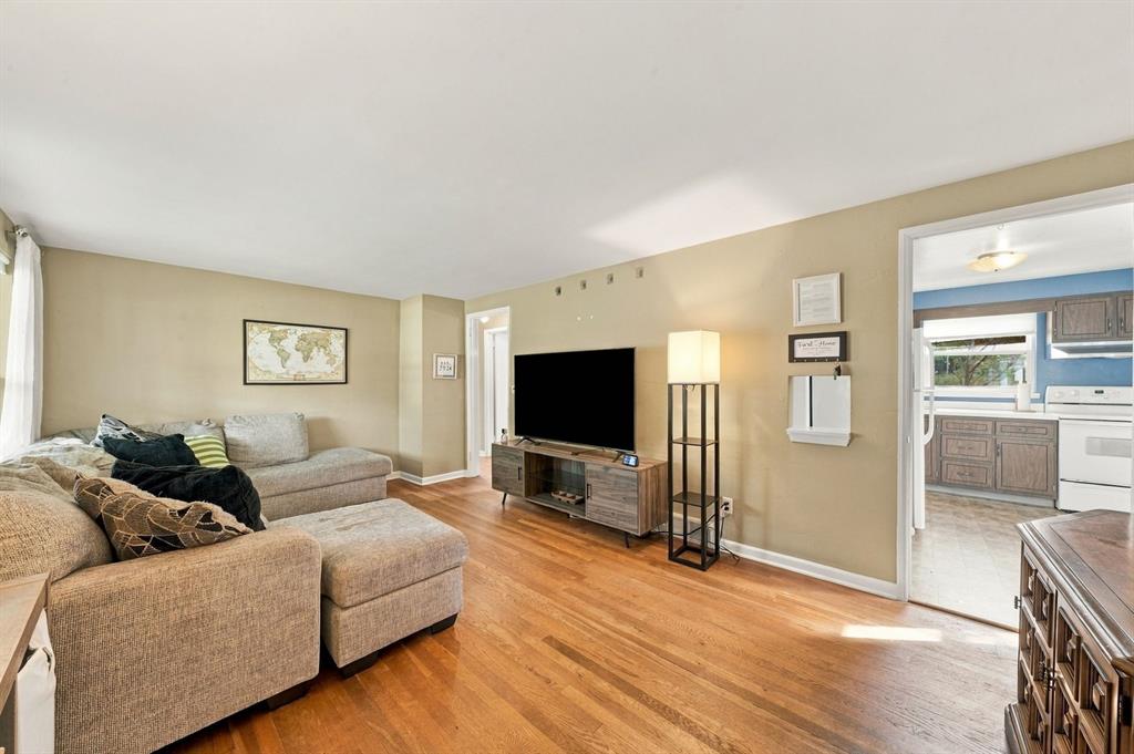 221 Orchard Spring Road Pittsburgh, PA 15220 - Photo 4 of 20 Hardwood floors living room and BRs