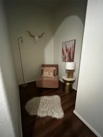 a living room with couch and a table