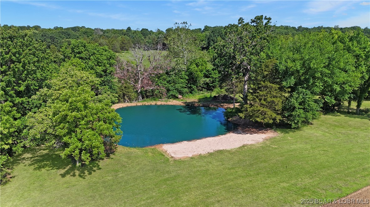 Put your toes in the sand & enjoy your pond