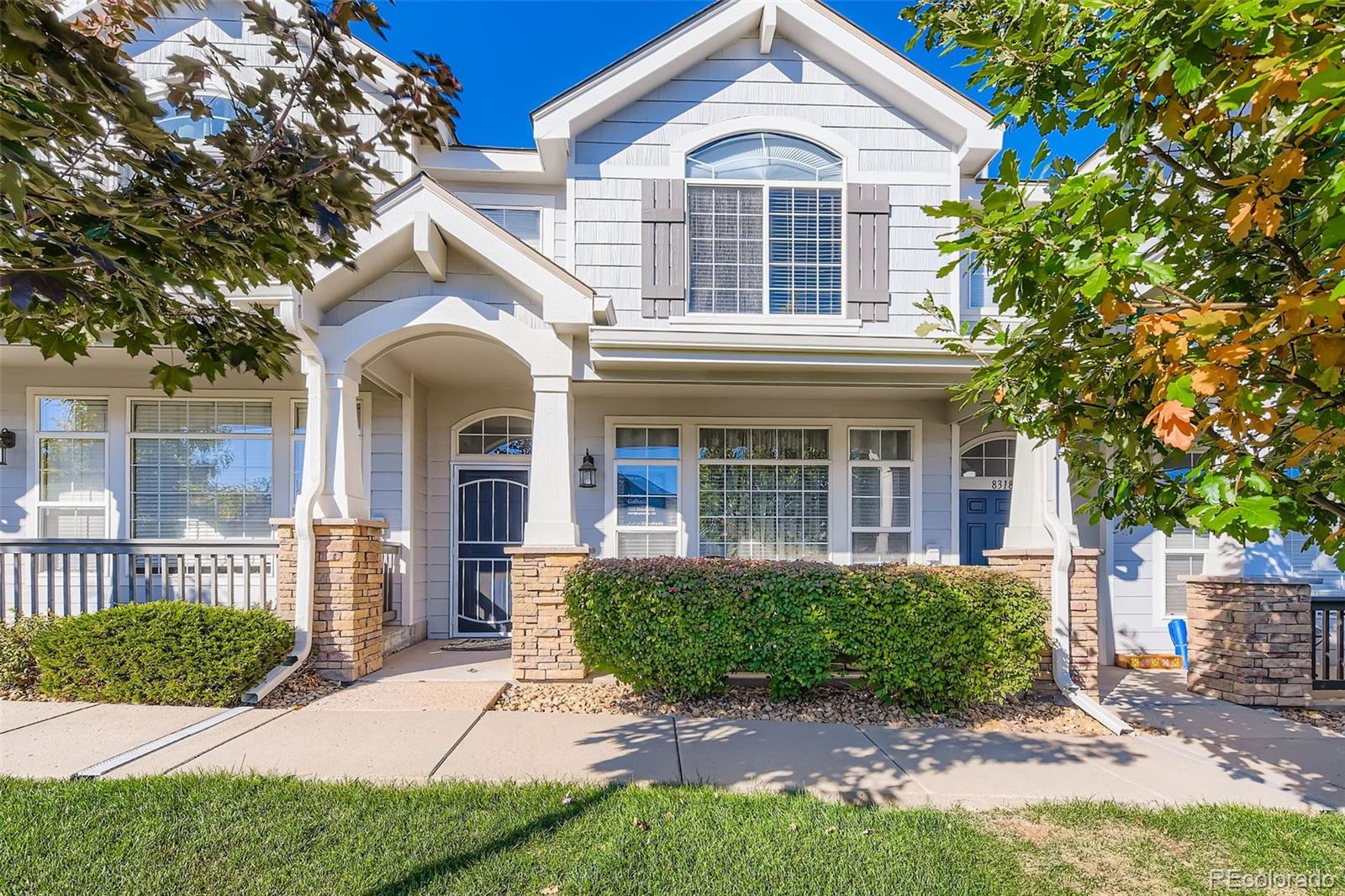 8320 Stonybridge Circle Littleton, CO 80126 - Photo 1 of 11 front view of a house with a yard