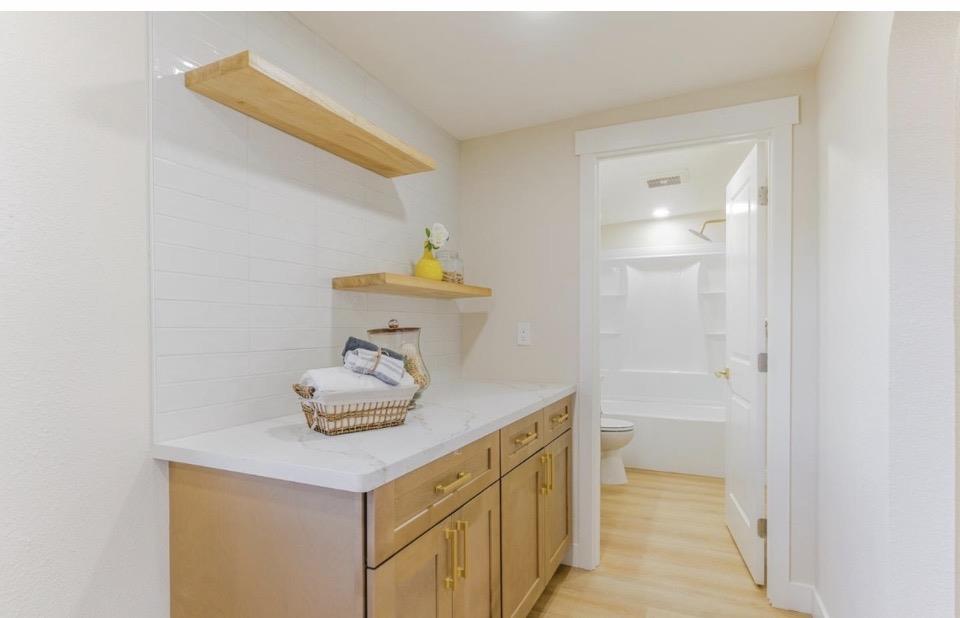 735 Locust Street San Jose, CA 95110 - Photo 19 of 21 a bathroom with a sink and vanity