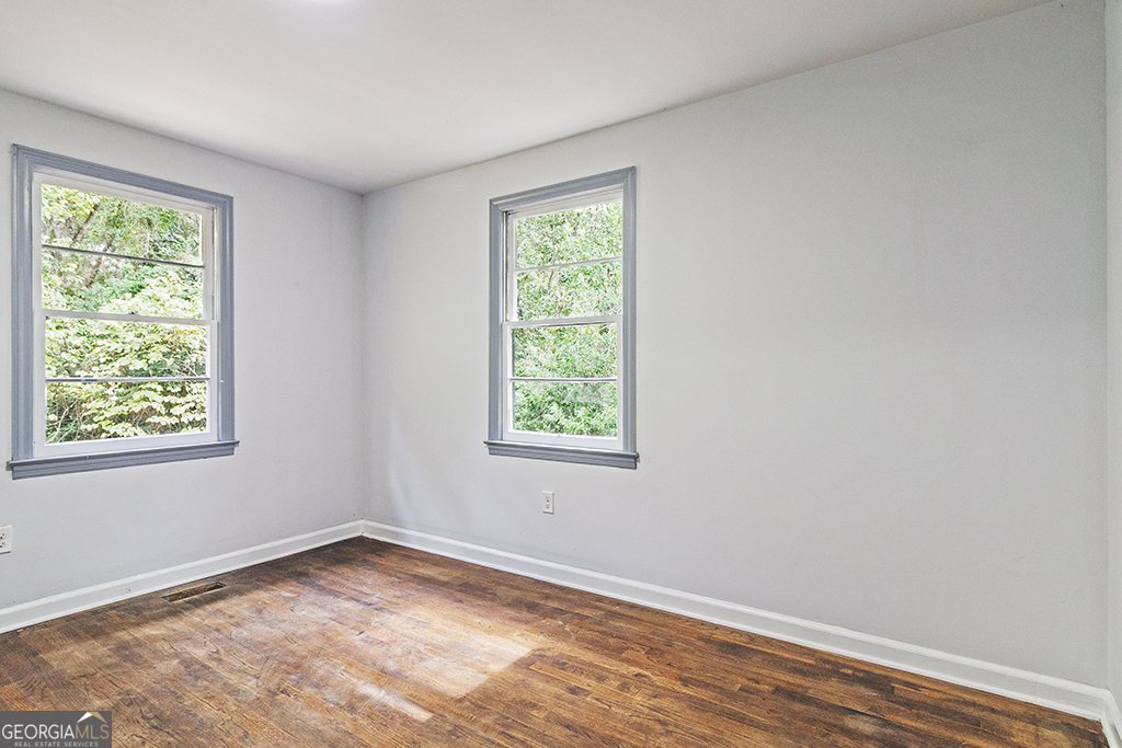 1124 North Beddingfield Drive Macon, GA 31206 - Photo 17 of 34 a view of empty room with window