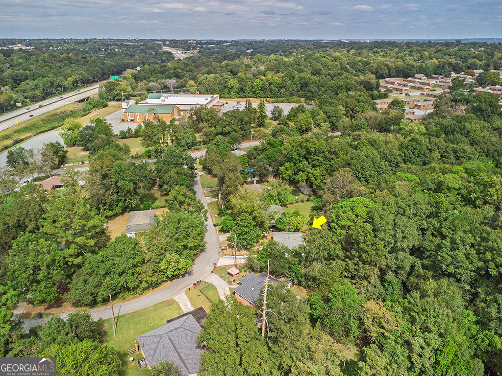 1124 North Beddingfield Drive Macon, GA 31206 - Photo 28 of 34 an aerial view of residential house with outdoor space and trees all around