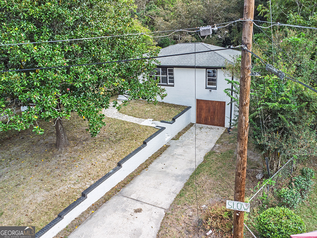 1124 North Beddingfield Drive Macon, GA 31206 - Photo 33 of 34 a aerial view of a house with a yard