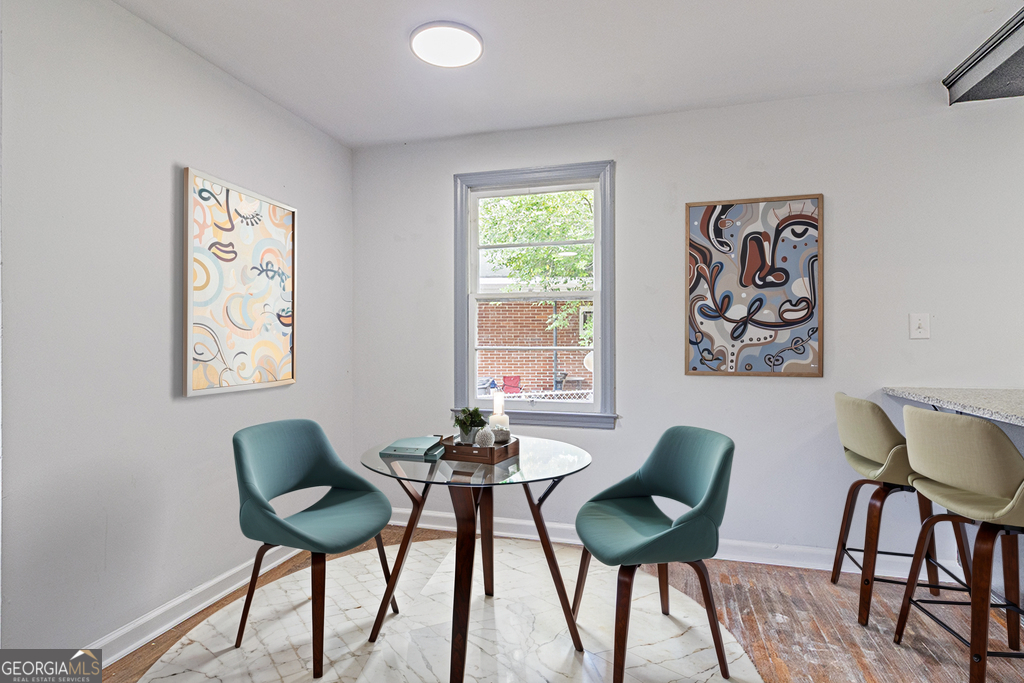 1124 North Beddingfield Drive Macon, GA 31206 - Photo 8 of 34 a view of a livingroom with furniture and a window