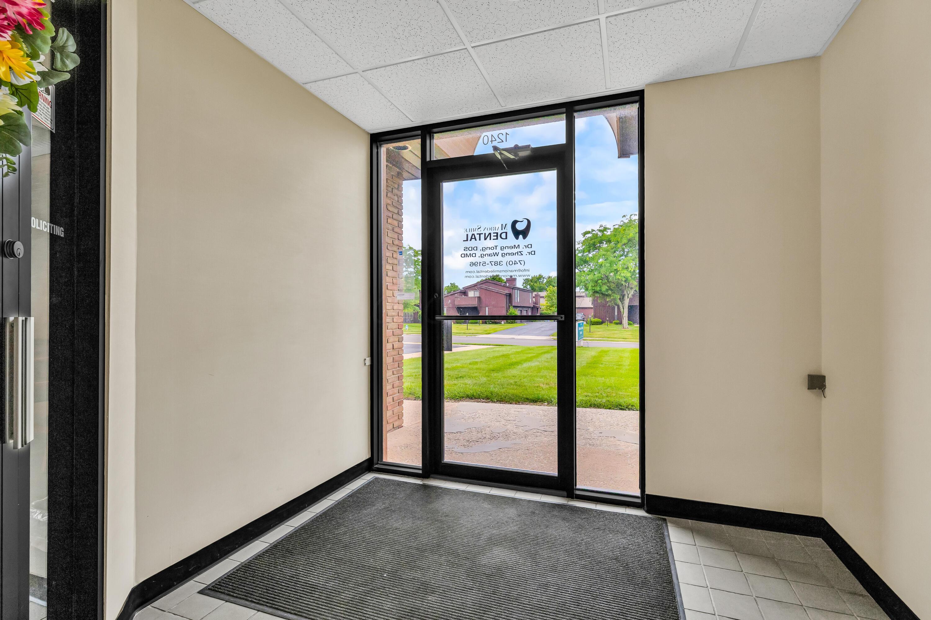 1240 Crescent Heights Road Marion, OH 43302 - Photo 4 of 60 • Ceramic tile flooring • Ivory painted walls • Acoustic ceiling tiles • Can lighting