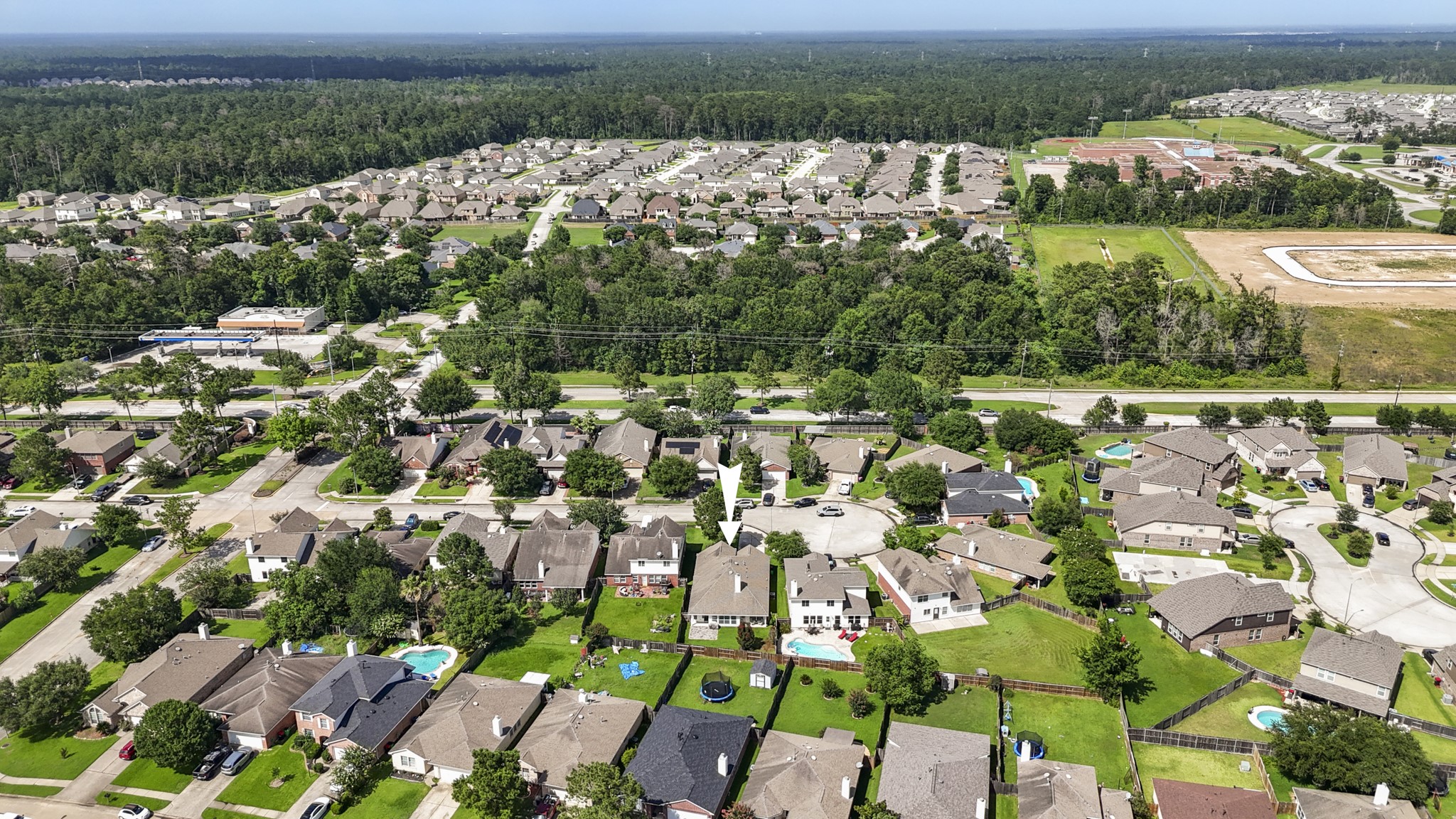 3422 Falcon Trail Court Spring, TX 77373 - Photo 32 of 35 an aerial view of residential houses with outdoor space and river