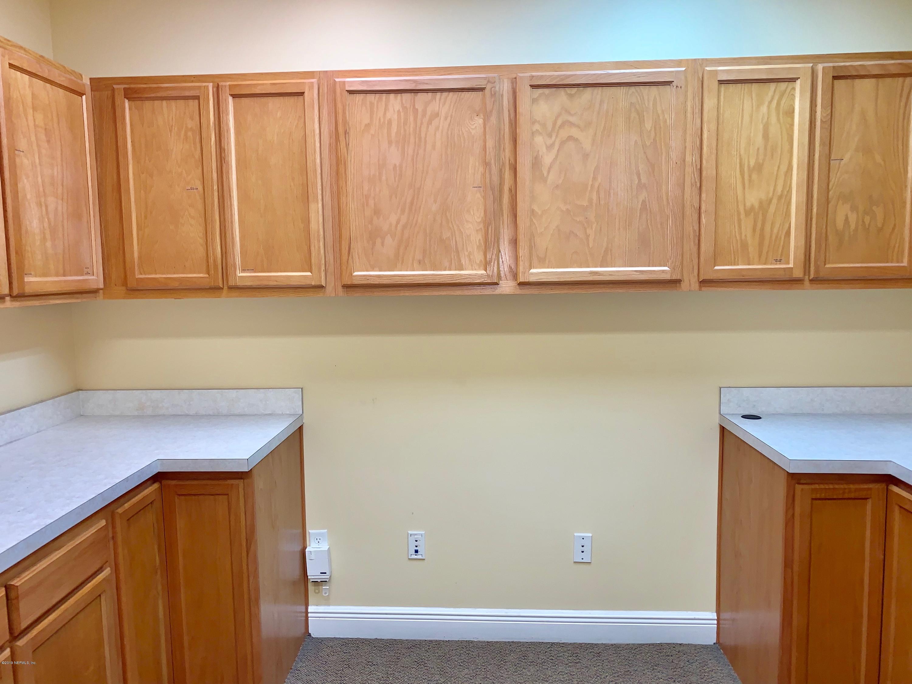 4465 Baymeadows Road, Unit 3 Jacksonville, FL 32217 - Photo 10 of 12 a room with a sink and a window