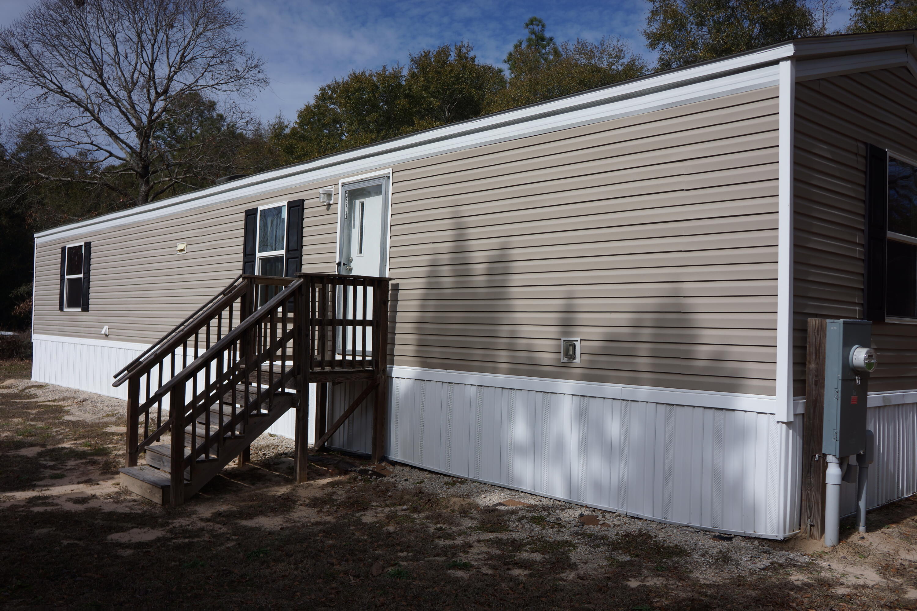 3031 Sandy Lane Crestview, FL 32536 - Photo 13 of 27 a view of a balcony with a tree