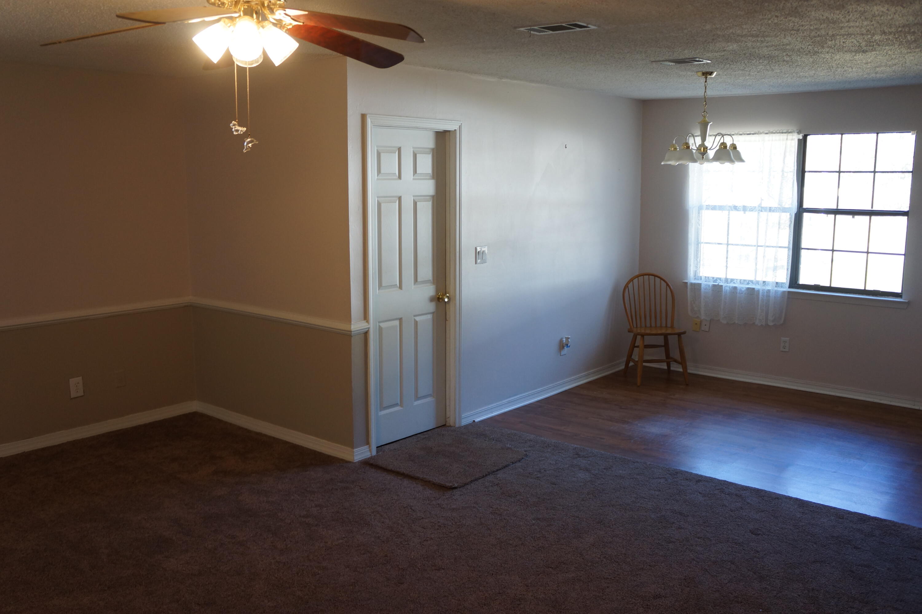 3031 Sandy Lane Crestview, FL 32536 - Photo 3 of 27 an empty room with windows and closet
