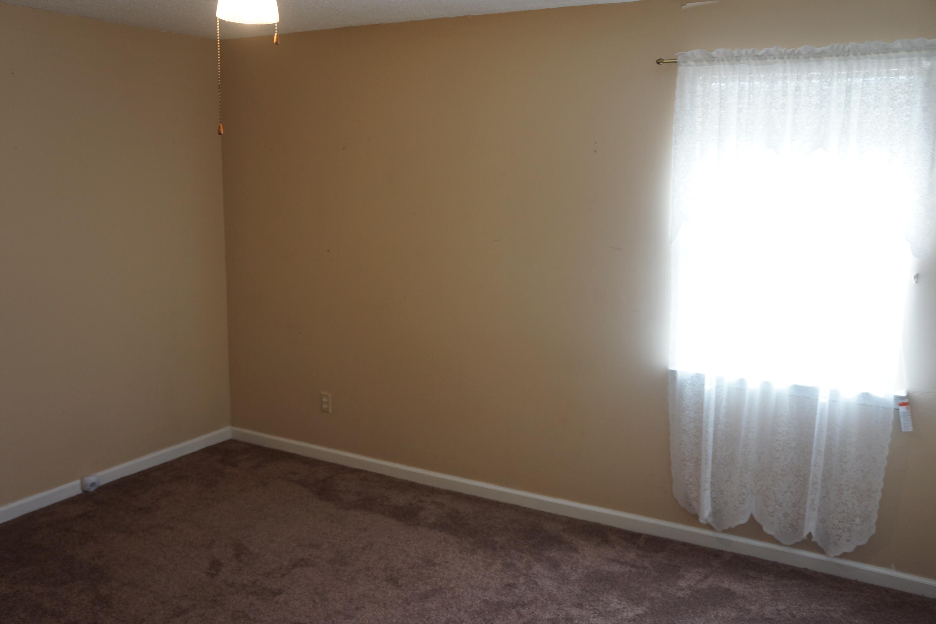 3031 Sandy Lane Crestview, FL 32536 - Photo 8 of 27 a room that has a window in it