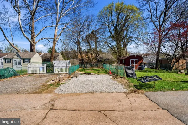 a front view of a building with parking space