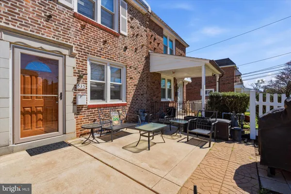 a building outdoor space with patio furniture