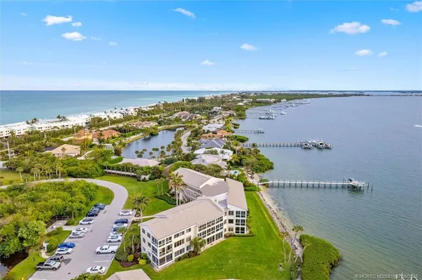 an aerial view of a house with a swimming pool