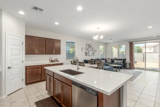 a bedroom with a bed and dresser