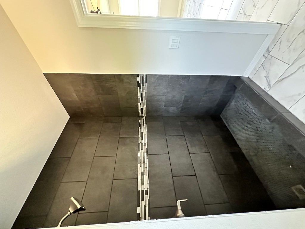 501 Maple Street Taylor, TX 76574 - Photo 17 of 18 a bathroom with a shower