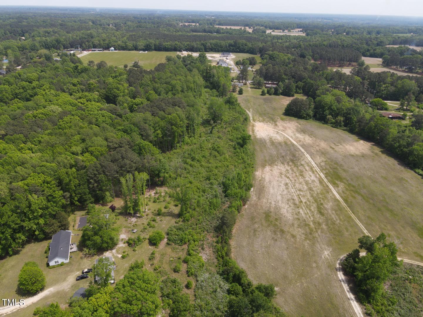 3701-2940 Wendell Road Wendell, NC 27591 - Photo 15 of 16 an aerial view of a house with a yard
