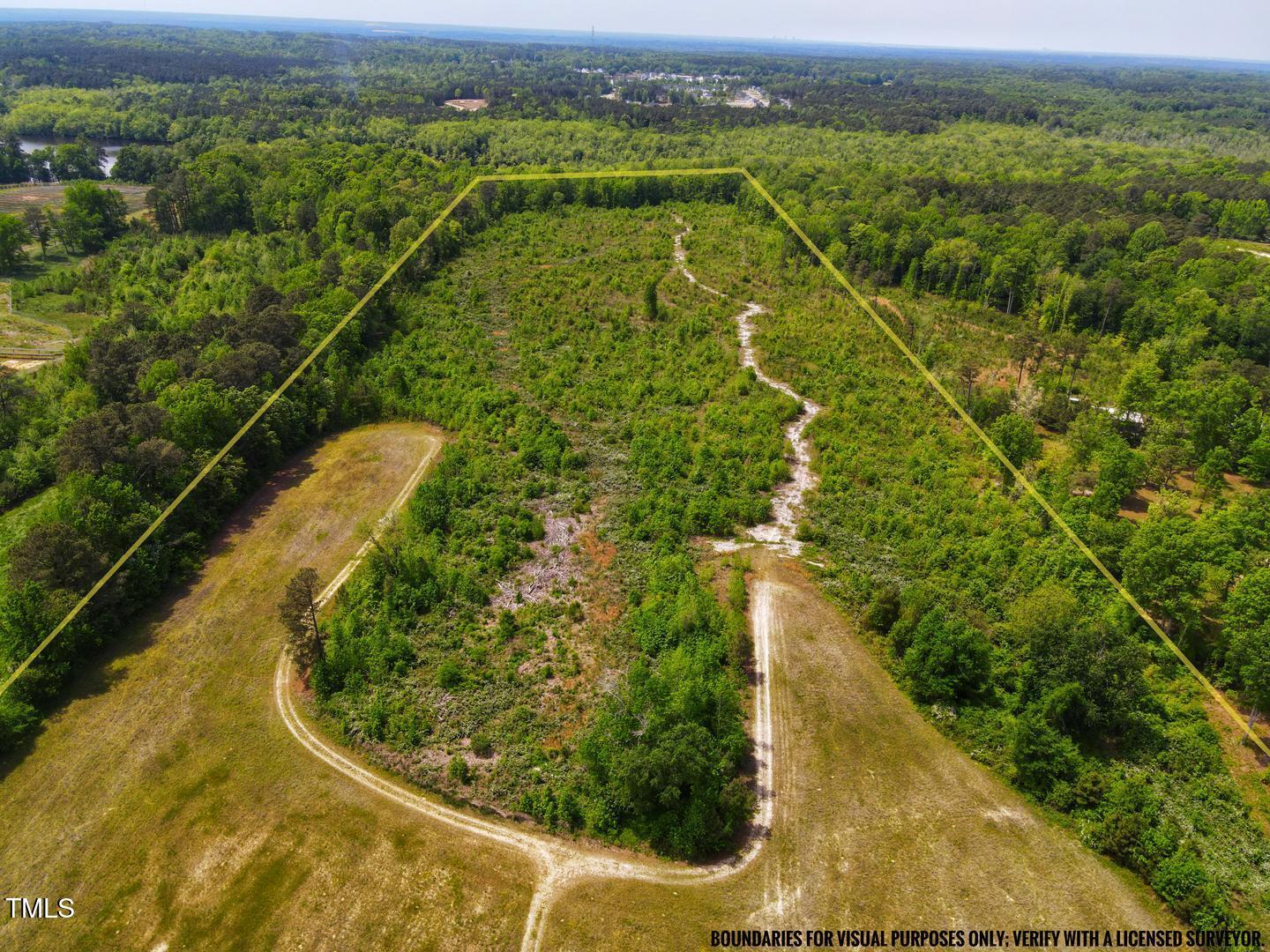 3701-2940 Wendell Road Wendell, NC 27591 - Photo 2 of 16 a view of a yard from a balcony