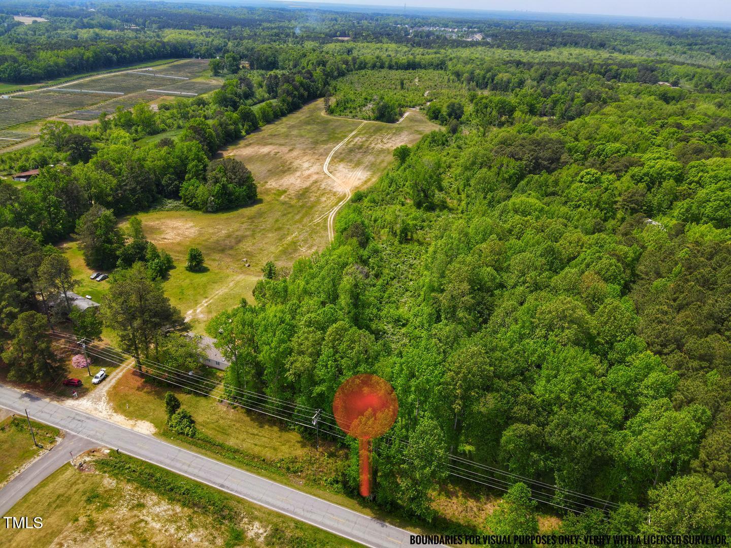 3701-2940 Wendell Road Wendell, NC 27591 - Photo 4 of 16 a view of a lake with a house in the background