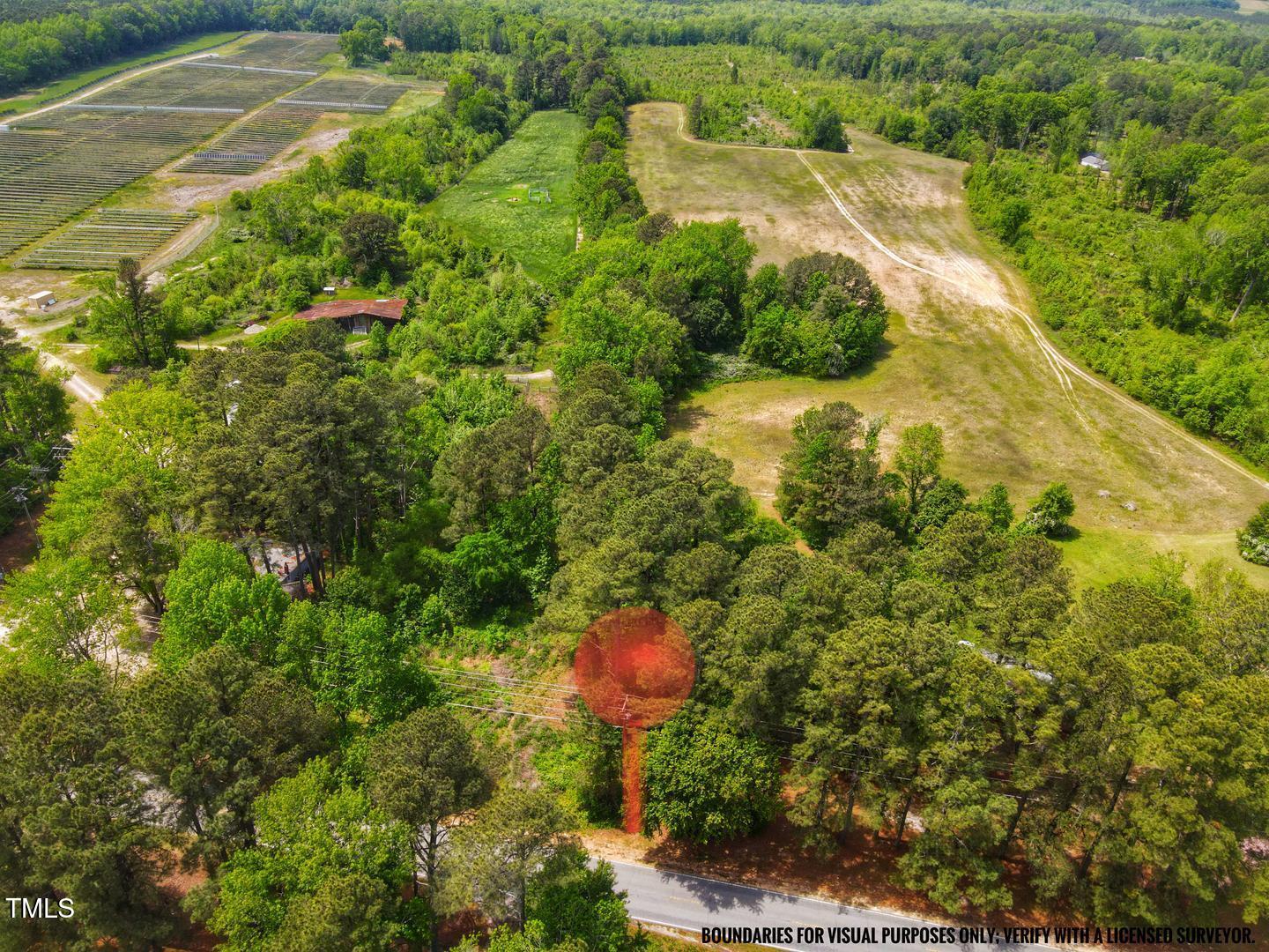 3701-2940 Wendell Road Wendell, NC 27591 - Photo 5 of 16 a view of a lake with a house