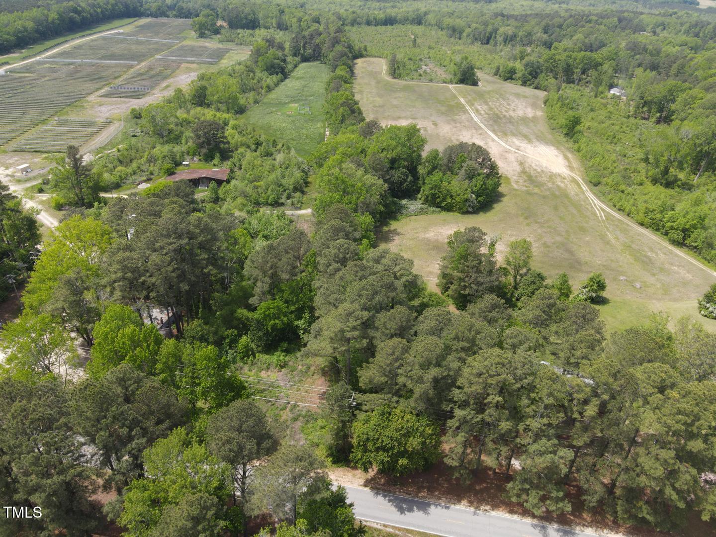 3701-2940 Wendell Road Wendell, NC 27591 - Photo 8 of 16 an aerial view of residential house with outdoor space and trees all around