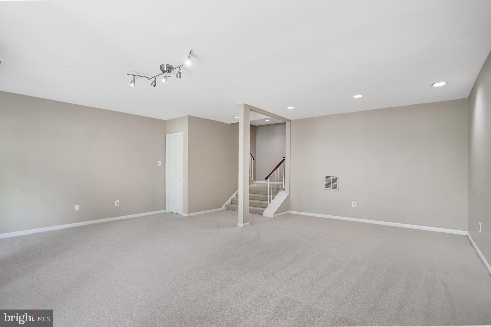 1953 Lakeport Way Reston, VA 20191 - Photo 41 of 60 a view of an empty room with a window