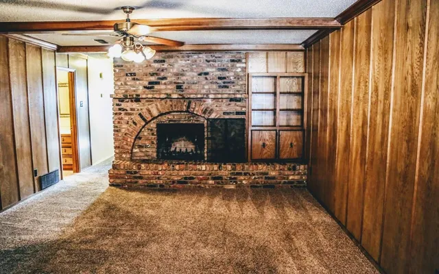 a living room with fireplace
