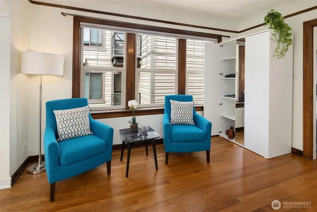 a living room with furniture and a window