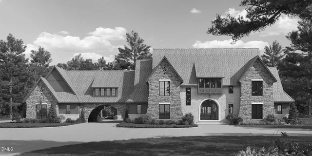 a view of a white apartments with large windows