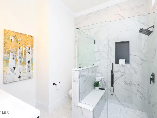 a bathroom with a bathtub and shower