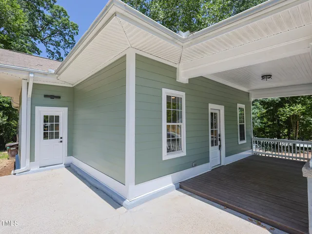 a view of a house with a roof deck