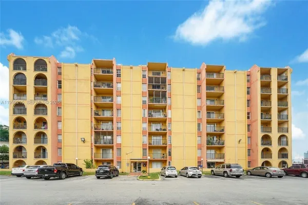 a building with parking space in front of it