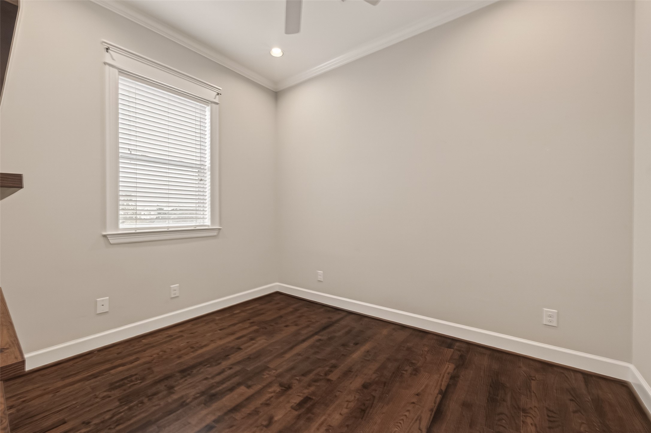 1431 West 25th Street Houston, TX 77008 - Photo 28 of 43 wooden floor in an empty room with a window