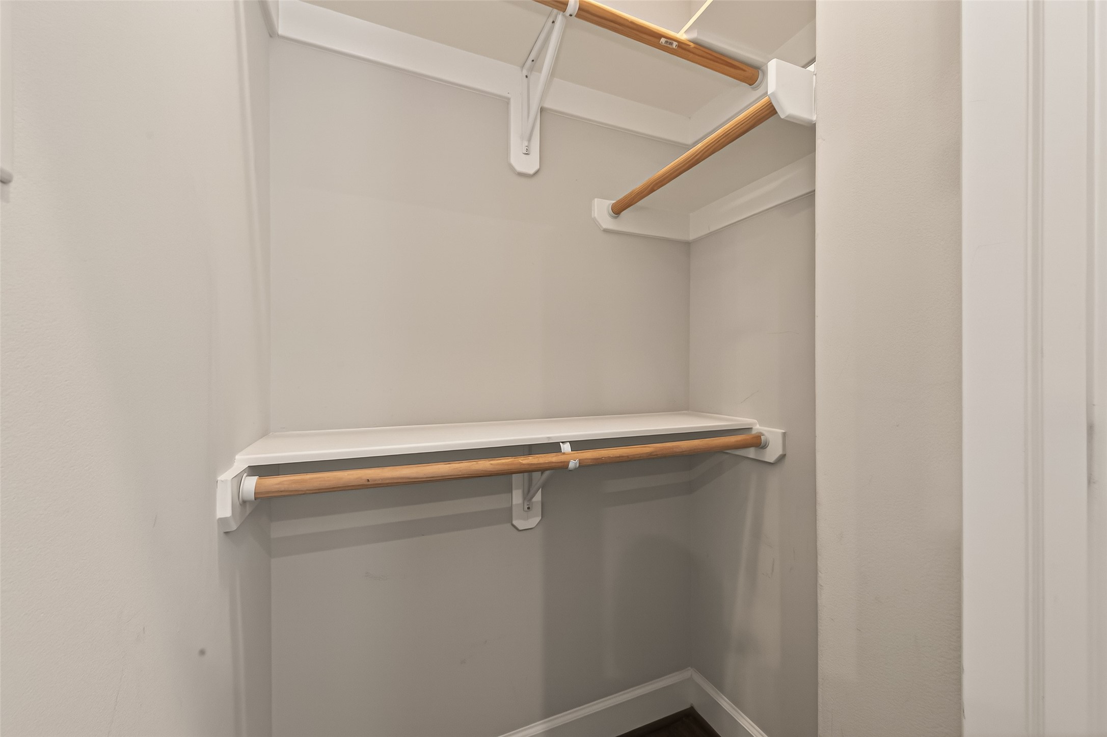 1431 West 25th Street Houston, TX 77008 - Photo 32 of 43 a view of a room with racks on the wall