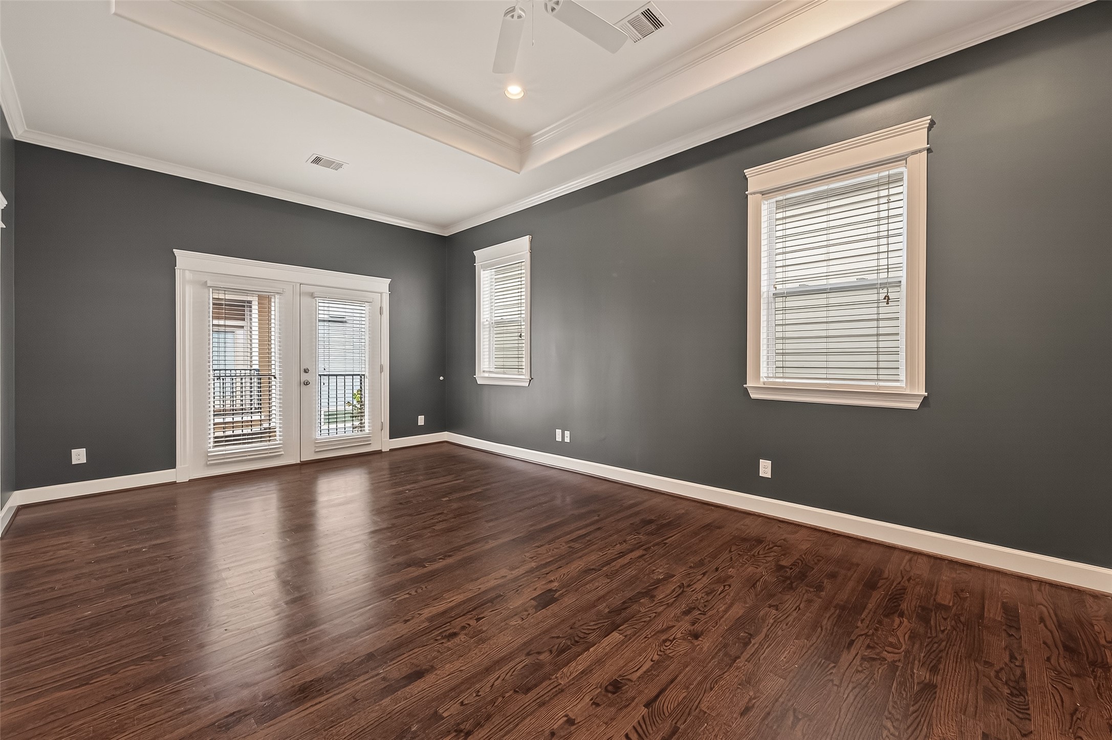 1431 West 25th Street Houston, TX 77008 - Photo 33 of 43 a view of an empty room with wooden floor and a window