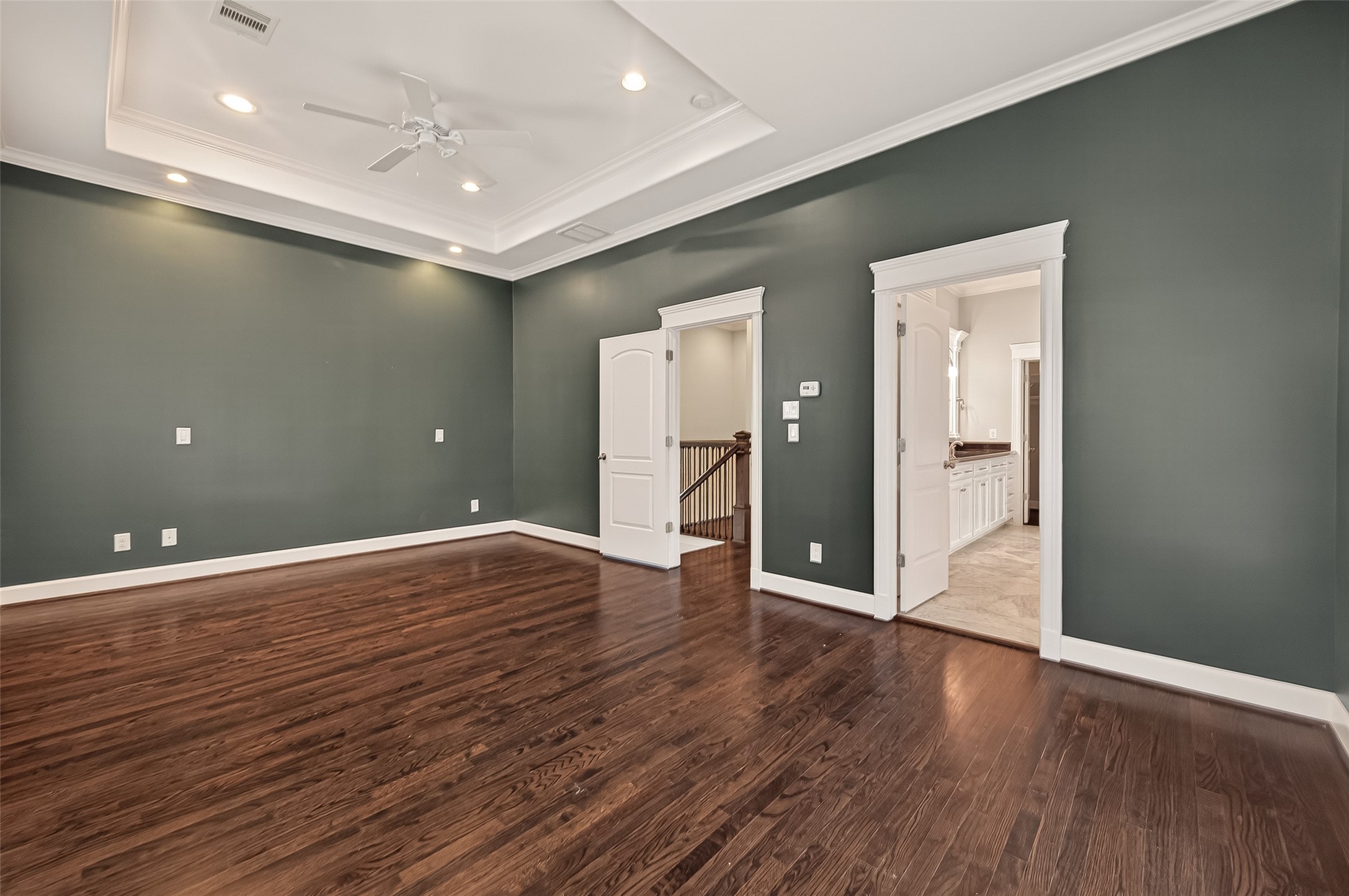 1431 West 25th Street Houston, TX 77008 - Photo 35 of 43 a view of an empty room with wooden floor and closet