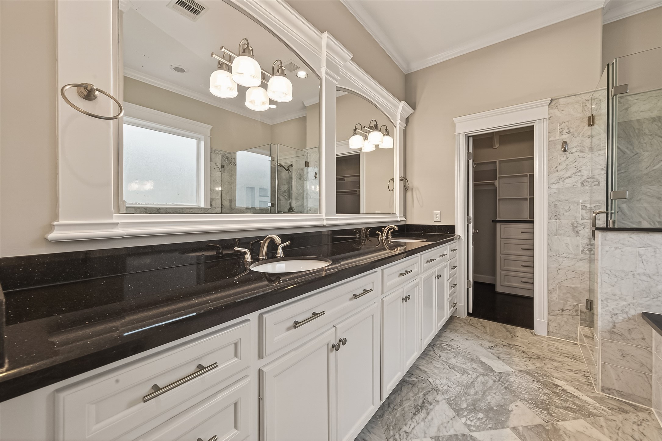 1431 West 25th Street Houston, TX 77008 - Photo 37 of 43 a bathroom with a sink a large mirror and a shower