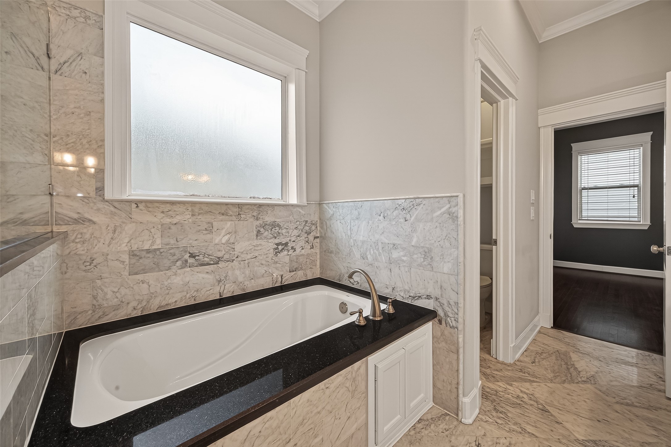 1431 West 25th Street Houston, TX 77008 - Photo 40 of 43 a view of a bath room with a sink and a mirror
